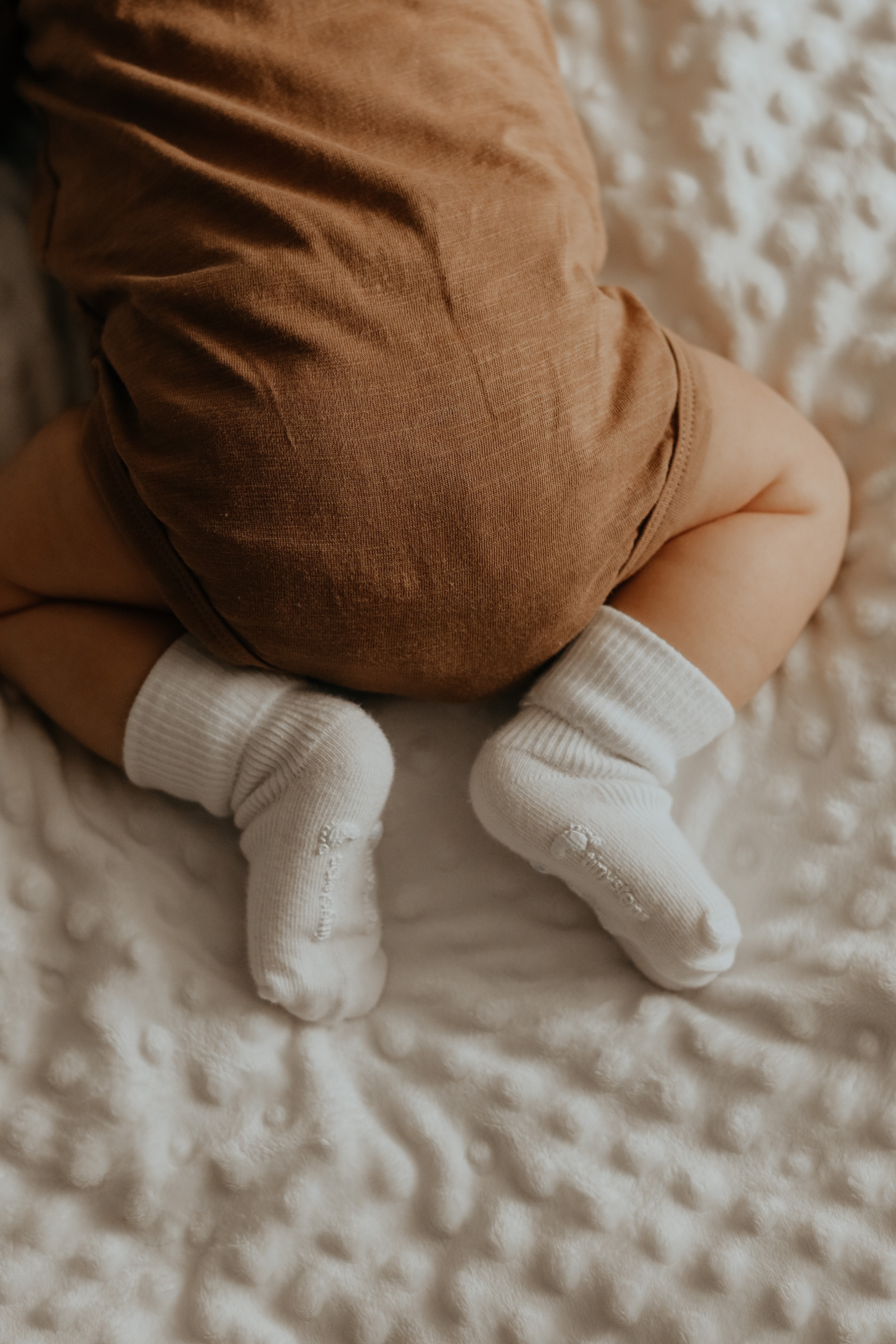 Baby sleeping peacefully in bed